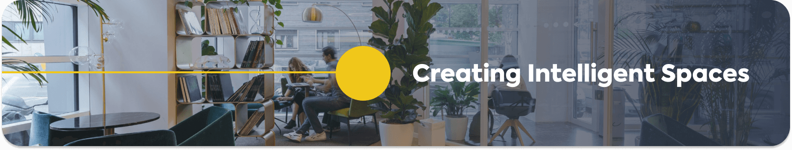 Fado banner: Creating Intelligent Spaces, over a photo of people working in a modern office