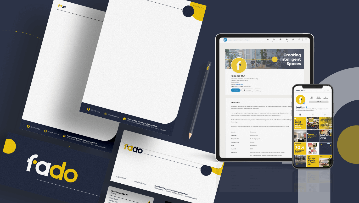 Fado stationery and a tablet showing the Fado LinkedIn page