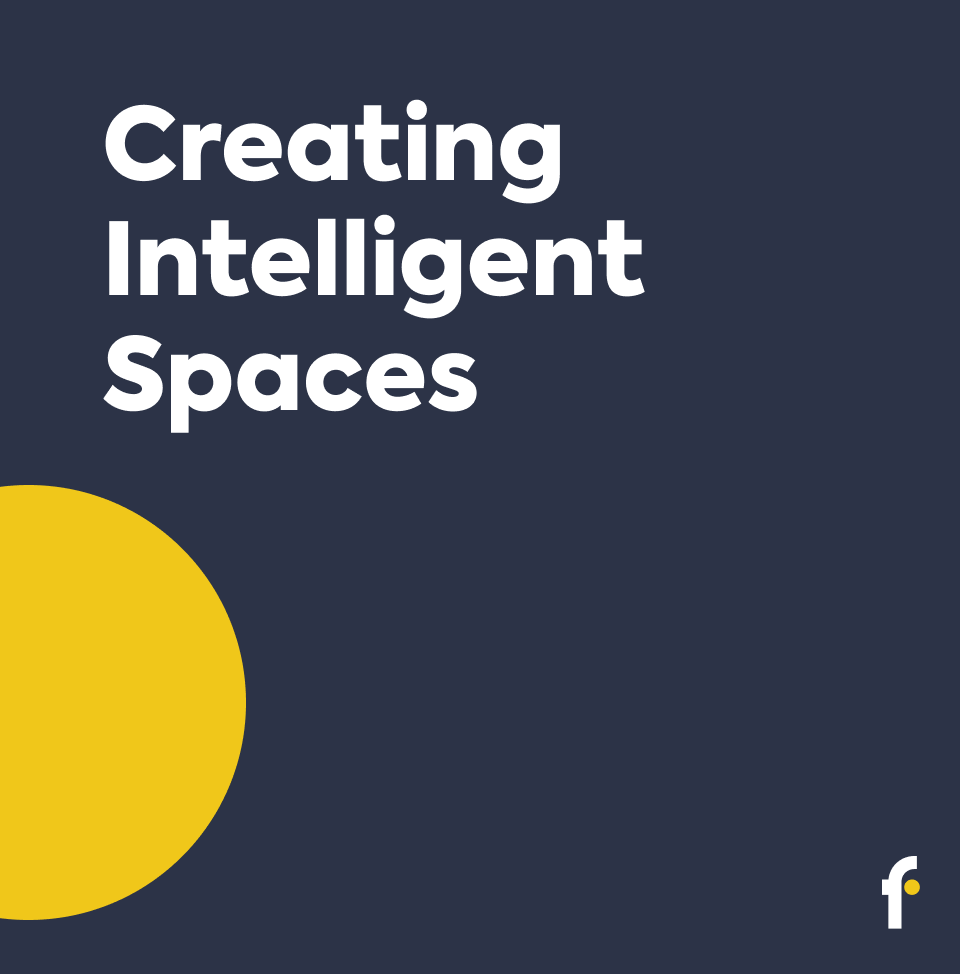 The Fado slogan Creating Intelligent Spaces on navy, with a yellow circle