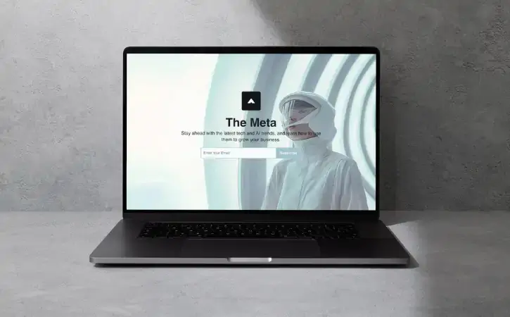 A laptop showing the sign-up page of The Meta newsletter